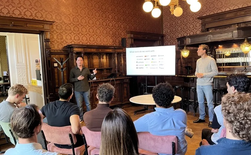 A founder presenting to the group during a session